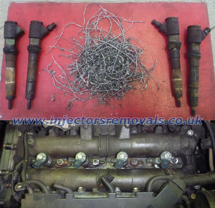 Broken injectors and bolts removed from Fiat
                Ducato 3.0 JTD
